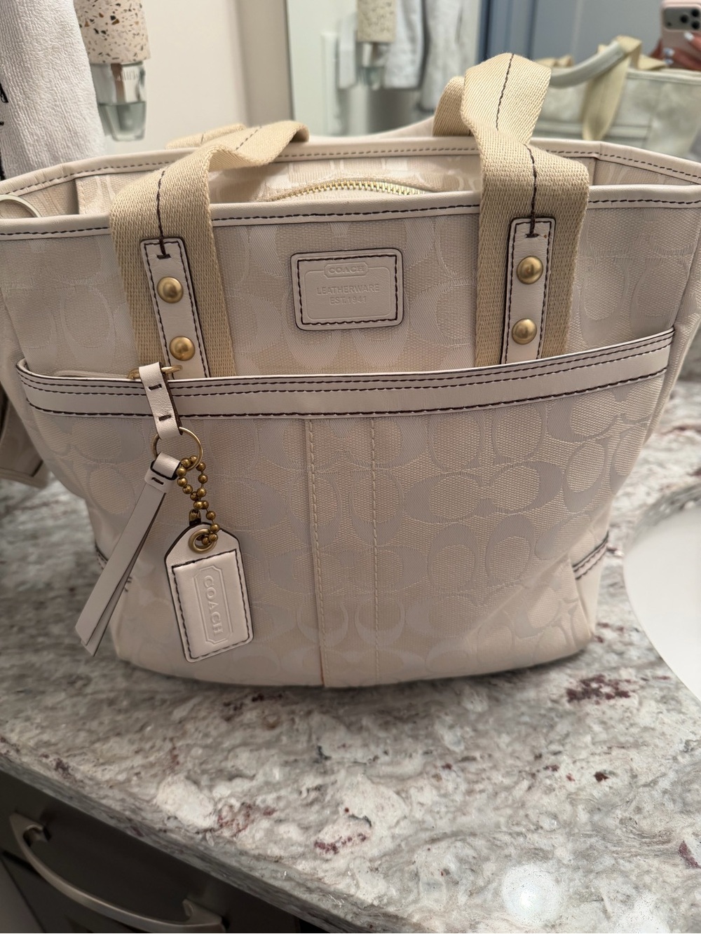 COACH Cream and Beige Signature Canvas Tote with Leather Charm